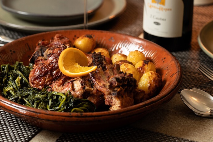 Traditional Portuguese meal served with potatoes and greens.