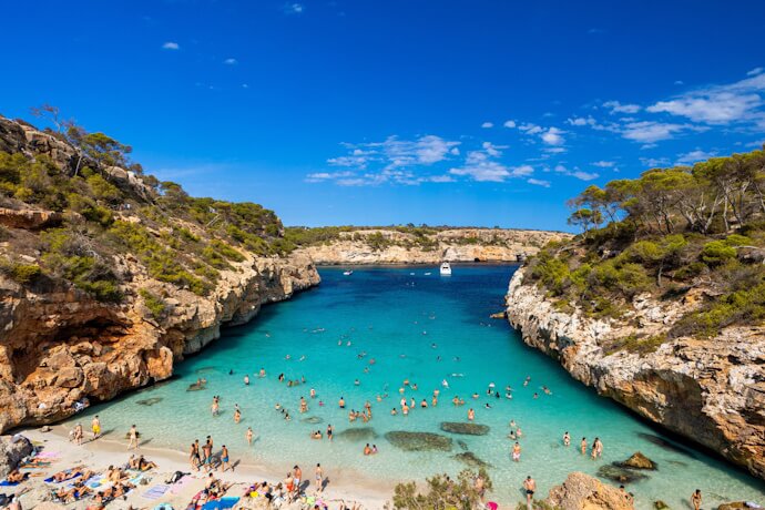 Turquoise waters and sandy beach at Caló des Moro, Mallorca, Spain