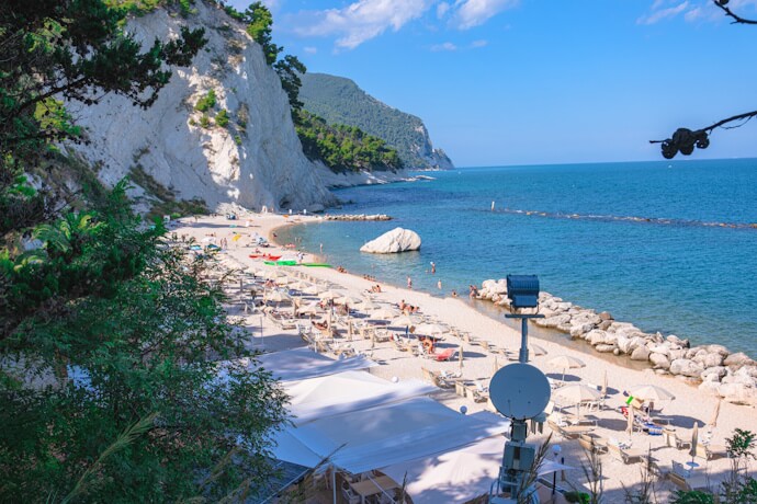 Quiet beach beneath the cliffs of the Conero coast.