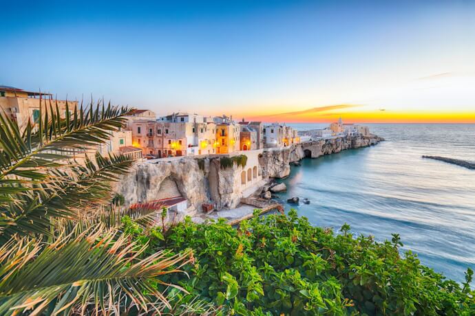 Coastal town of Vieste overlooking the Adriatic at sunset.