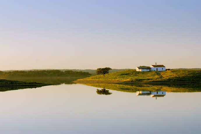 Peaceful Alentejo countryside with lake and rural landscape