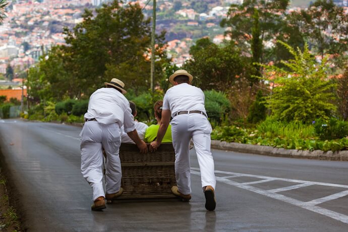 Traditional wicker toboggan ride in Monte, Funchal