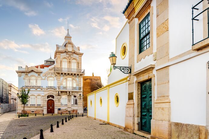 Historic streets and traditional architecture in Faro, Portugal.