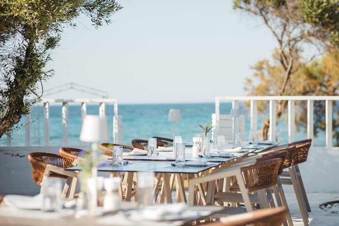 Seaside restaurant terrace overlooking the Algarve coast in Portugal.