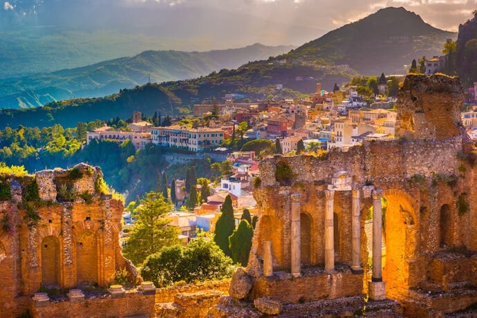 Greek Theater of Taormina Sicily with mountain views