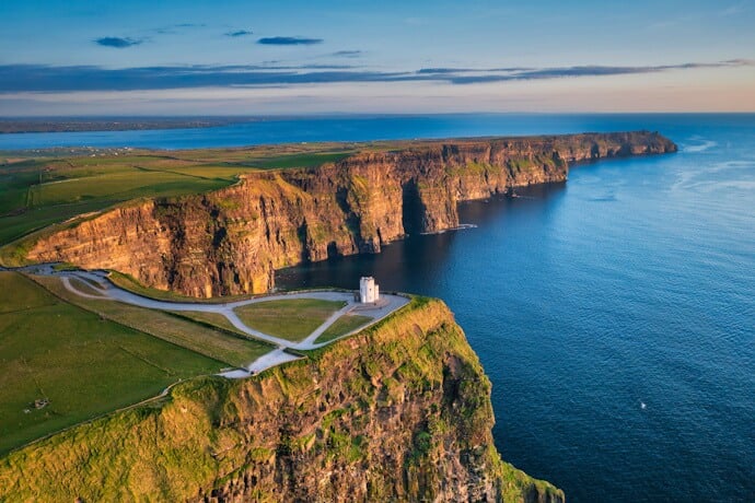 Cliffs of Moher, towering sea cliffs offering breathtaking Atlantic views, crowned by O’Brien’s Tower.