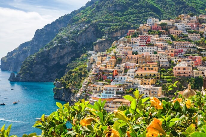 Daytime view of Positano on Italys Amalfi Coast, with colorful hillside houses overlooking the Mediterranean
